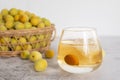 A glass of Japanese plum wine `Umeshu