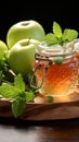 Glass jar Apple jam, two apples, green mint on wooden background