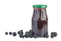 Glass jar with black currants jam and some berries near Royalty Free Stock Photo