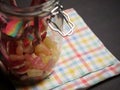 Glass jar of candy sweets medium shot Royalty Free Stock Photo
