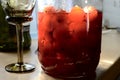 Glass jar with canned apples sunlit