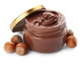 Glass jar of chocolate paste with hazelnuts on white background Royalty Free Stock Photo