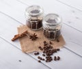 Glass jar with coffee beans Royalty Free Stock Photo