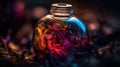 a glass jar with a colorful liquid inside of it on a bed of leaves and twigs in the background is a blurry image of a blue and Royalty Free Stock Photo