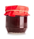 Glass jar with delicious strawberry jam on white background Royalty Free Stock Photo