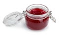 Glass jar with delicious strawberry jam on white background Royalty Free Stock Photo