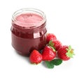 Glass jar with delicious strawberry jam on white background Royalty Free Stock Photo