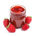 Glass jar with delicious strawberry jam on white background