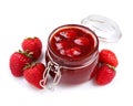 Glass jar with delicious strawberry jam on white background Royalty Free Stock Photo