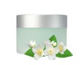 Glass jar of face cream and jasmine flowers isolated on white