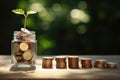 A glass jar filled with coins, serving as a money-saving container, with a vibrant plant sprouting out of it, Growing stacks of