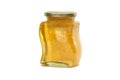 Glass jar filled with honey and honeycomb isolated on white Royalty Free Stock Photo