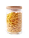 Glass jar filled with penne pasta isolated Royalty Free Stock Photo