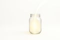 A glass jar filled with soft light. Space for text. Royalty Free Stock Photo
