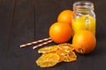 glass jar of fresh orange juice with fresh fruits on wooden table Royalty Free Stock Photo