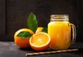 Glass jar of fresh orange juice with fresh fruits Royalty Free Stock Photo