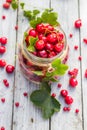 Glass jar fruits cherries currants Royalty Free Stock Photo