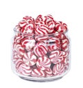 Glass jar full of red striped caramel sweets