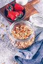 Glass Jar with granola and strawberries. Breakfast Diet Clean Food. Close up Royalty Free Stock Photo