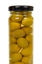 Glass jar with green olives. Canning supply food Royalty Free Stock Photo