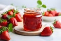 Glass jar with homemade marmalade or jam with fresh strawberry fruits