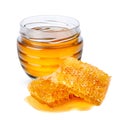 Jar with honey and honeycomb isolated on white background Royalty Free Stock Photo