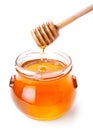 Glass jar of honey with wooden drizzler Royalty Free Stock Photo