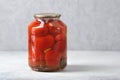 Glass jar with iron lid with canned red tomatoes Royalty Free Stock Photo