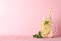 Glass jar with lemonade on background. Fresh drink Royalty Free Stock Photo