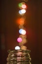 Glass jar with magical bokeh dots