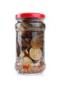 Glass jar with marinated milk mushrooms