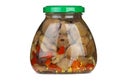 Glass jar with marinated suillus mushrooms