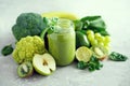 Glass jar mugs with green health smoothie. Copy space. Vegan, vegetarian concept. Alkaline food. Banner