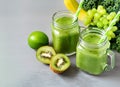 Glass jar mugs with green health smoothie kale leaves lime apple kiwi grapes banana. Generative AI Royalty Free Stock Photo