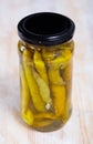 Glass jar with pickled green hot pepper Royalty Free Stock Photo