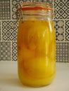 Glass Jar of Pickled Lemons Royalty Free Stock Photo