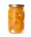 Glass jar with pickled peaches isolated Royalty Free Stock Photo