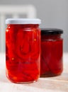 Glass jar with pickled red bell pepper Royalty Free Stock Photo