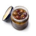 Glass jar with pitted Italian Leccino olives close up on white background Royalty Free Stock Photo