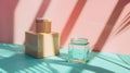 Glass Jar and Rectangular Box on Pastel Surface Royalty Free Stock Photo