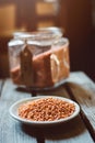 Glass jar with reg orange lentil