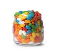 Glass jar of tasty bright jelly beans isolated Royalty Free Stock Photo