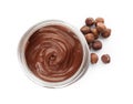 Glass jar with tasty chocolate cream and hazelnuts isolated on white, Royalty Free Stock Photo