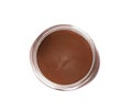 Glass jar with tasty chocolate cream on white, top view Royalty Free Stock Photo