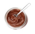 Glass jar with tasty chocolate cream and spoon on white, top view Royalty Free Stock Photo