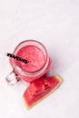 Glass Jar of Tasty Watermelon Smoothie on Blue Background Vertical Healthy and Tasty Summer Drink Royalty Free Stock Photo