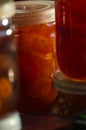 Glass jars with apple jam close-up. Home canning. Delicious dessert for tea. Cooking. Vertical photo Royalty Free Stock Photo