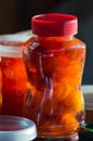 Glass jars with apple jam close-up. Home canning. Delicious dessert for tea. Cooking. Vertical photo Royalty Free Stock Photo