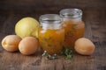 Glass jars with apricot jam Royalty Free Stock Photo