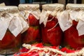 glass jars with canned red paprika